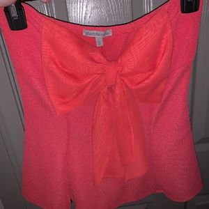 Pinkish orange tub top blouse with bow